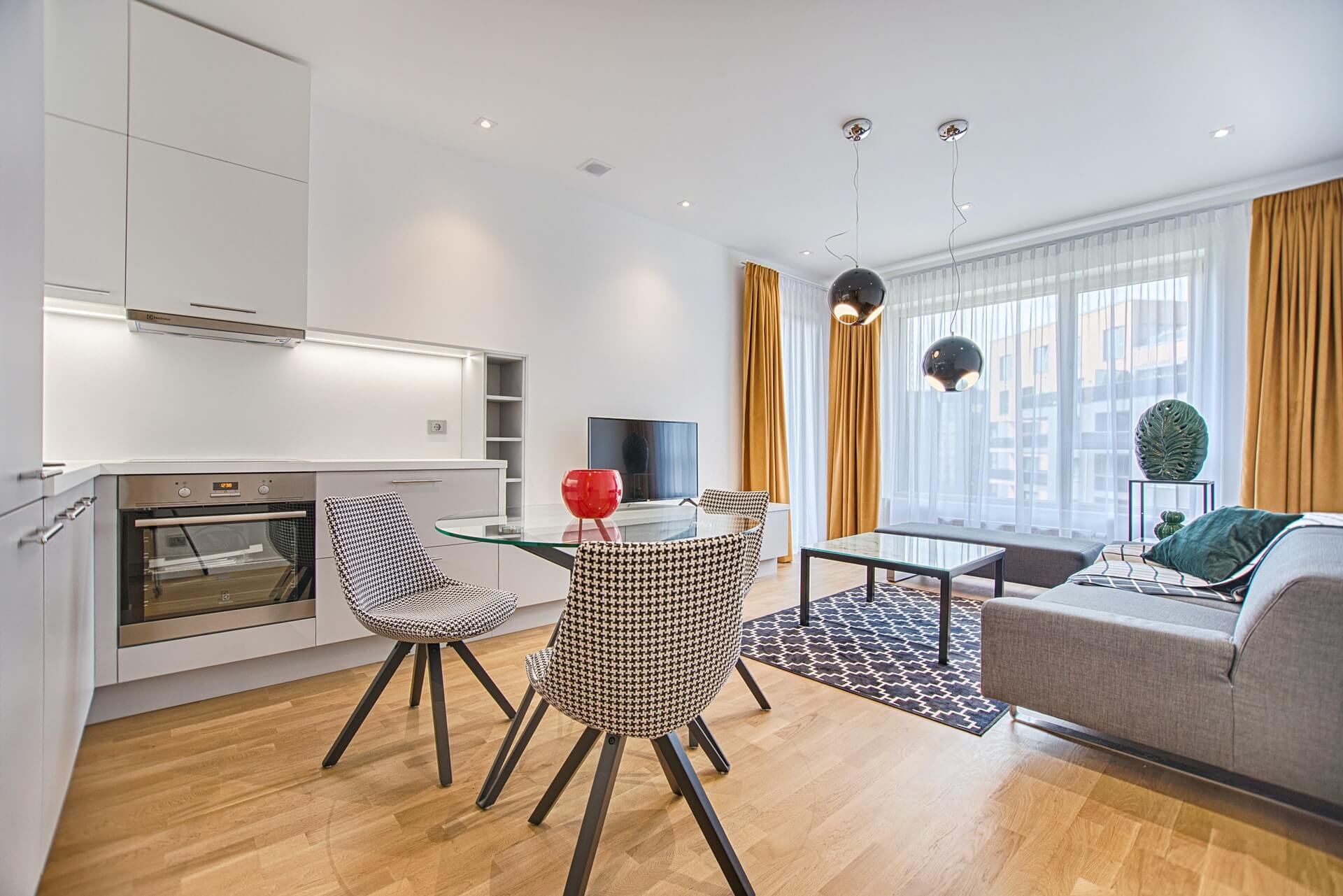 Testimonios Two Chairs With Glass Table On Living Room Near Window